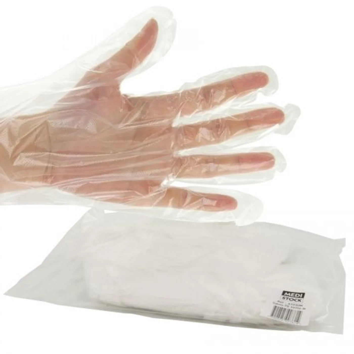 Clear vinyl glove on a hand with a package of gloves below on a white background